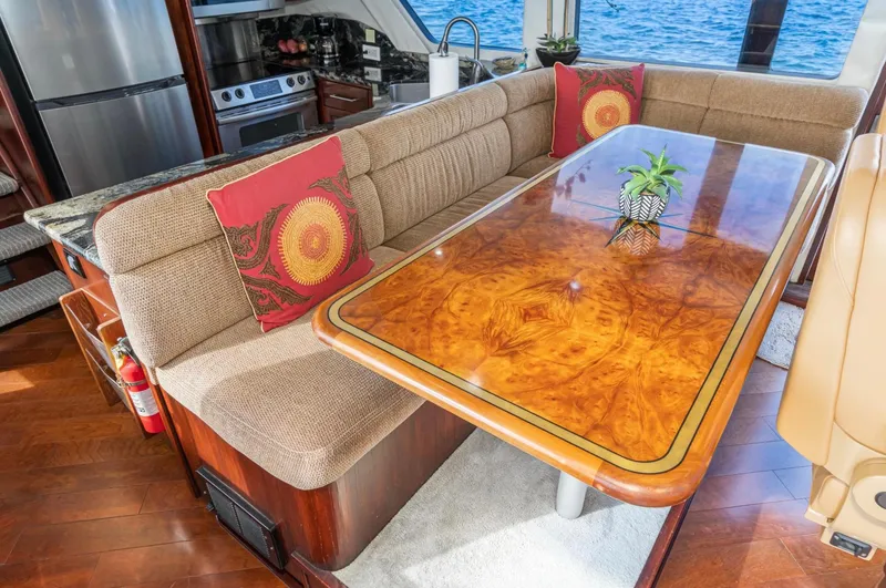 Slide: The Image of Luxurious interior of 1998 Pacific Mariner 65 Motoryacht with elegant dining area and ocean view. - 39