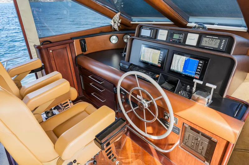 Slide: The Image of Luxurious 1998 Pacific Mariner 65 Motoryacht helm with advanced navigation systems. - 40