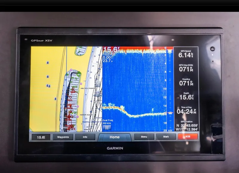 Slide: The Image of Garmin GPS display on 1998 Pacific Mariner 65 Motoryacht, showing navigation and depth data. - 43