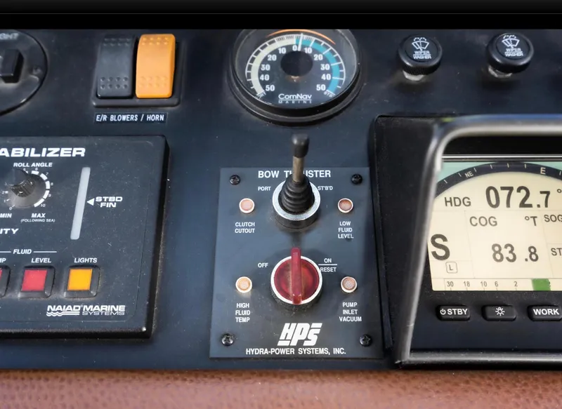Slide: The Image of Control panel of a 1998 Pacific Mariner 65 Motoryacht with navigation instruments. - 44