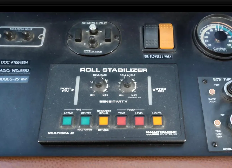 Slide: The Image of Control panel of a 1998 Pacific Mariner 65 Motoryacht with roll stabilizer system. - 45