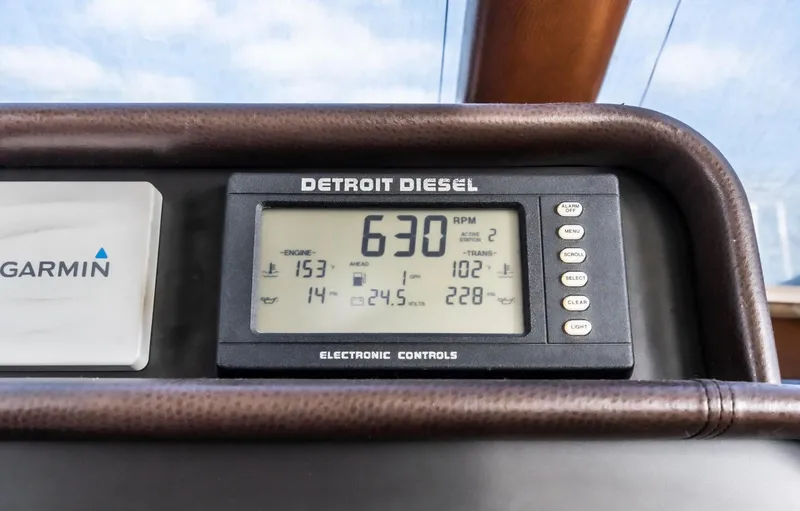 Slide: The Image of Detroit Diesel electronic controls on 1998 Pacific Mariner 65 Motoryacht dashboard. - 47