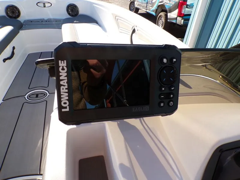 Slide: The Image of Lowrance fish finder on 2025 Tahoe T21 boat dashboard. - 15
