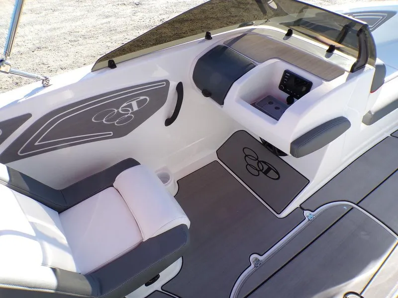 Slide: The Image of 2025 Tahoe T21 boat interior with modern seating and dashboard design. - 19