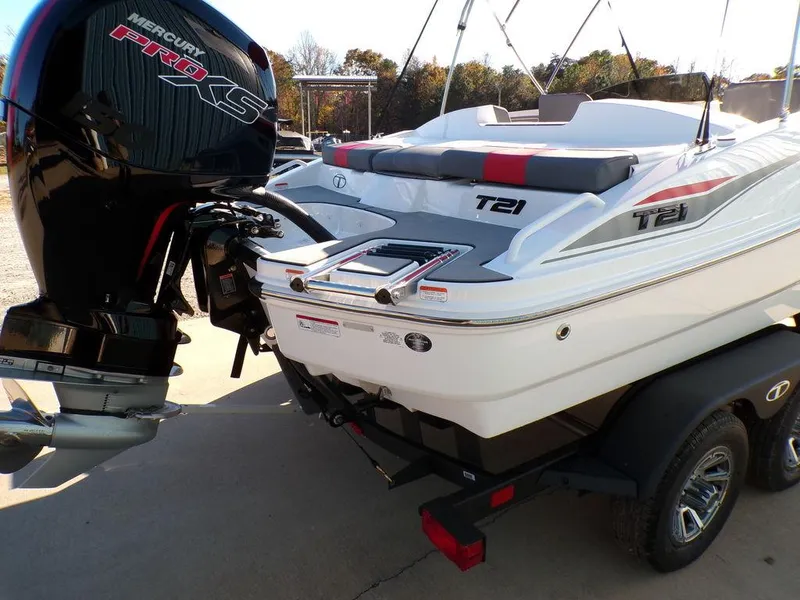 Slide: The Image of 2025 Tahoe T21 boat with Mercury Pro XS engine on trailer. - 7