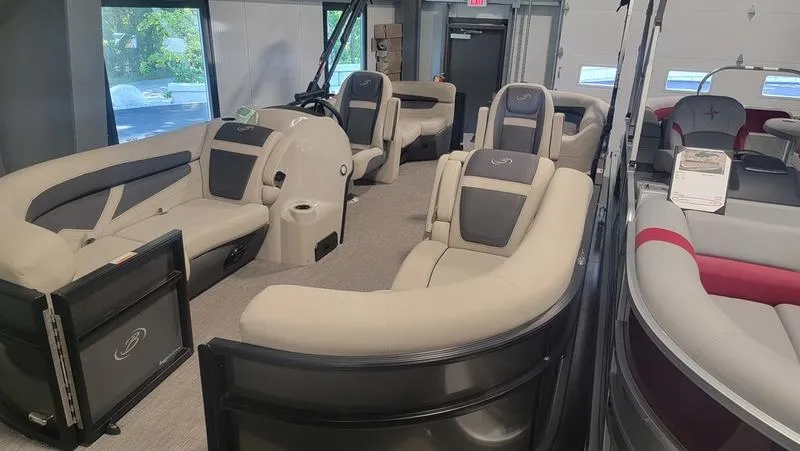 Slide: The Image of 2022 Barletta C20QC pontoon boat interior with plush seating and modern design. - 3