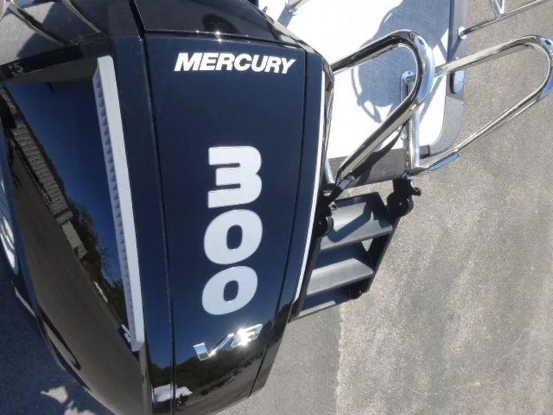 Slide: The Image of Mercury 300 V8 engine on 2025 Harris SUNLINER SP 250 boat, close-up view. - 15
