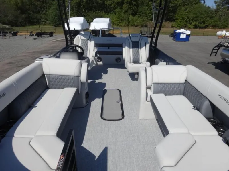 Slide: The Image of 2025 Harris SUNLINER SP 250 boat interior with spacious seating and modern design. - 3