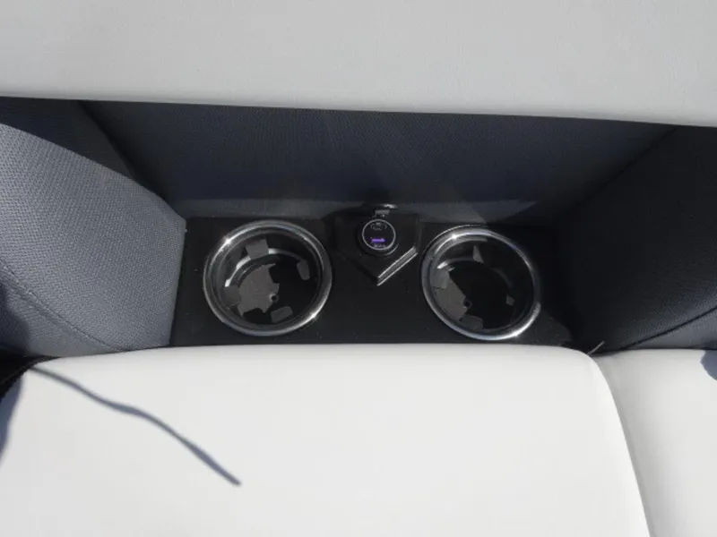 Slide: The Image of Cup holders and USB port in 2025 Harris SUNLINER SP 250 boat interior. - 7