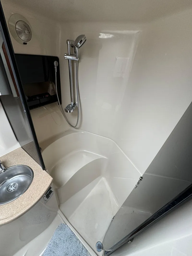 Slide: The Image of 2005 Four Winns 378 Vista boat shower with sink and modern fixtures. - 20