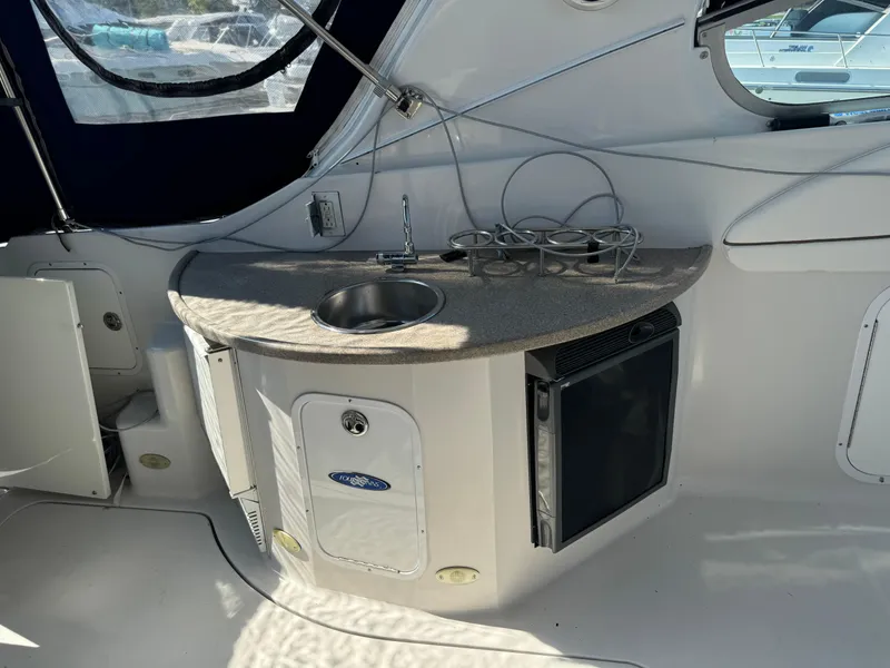 Slide: The Image of 2005 Four Winns 378 Vista yacht interior with sink and mini fridge. - 5