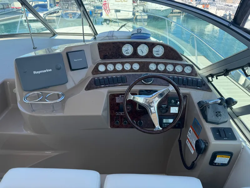 Slide: The Image of Helm of 2005 Four Winns 378 Vista boat with steering wheel and navigation instruments. - 8