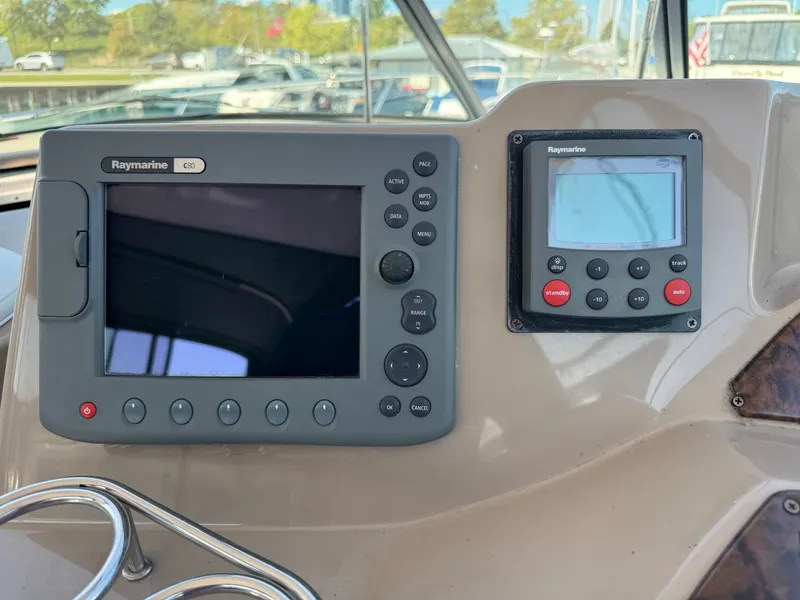 Slide: The Image of Raymarine navigation system on 2005 Four Winns 378 Vista boat dashboard. - 9