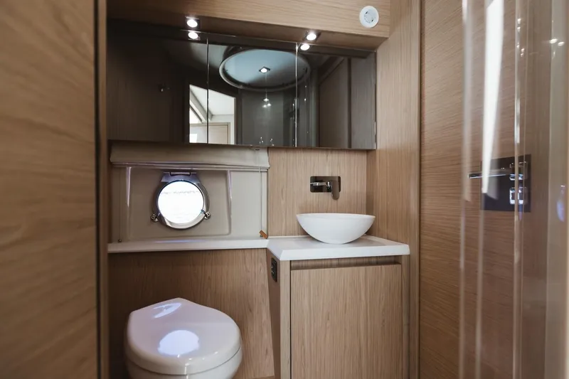 Slide: The Image of Luxurious bathroom in 2015 Beneteau Monte Carlo 5 yacht with modern fixtures. - 26