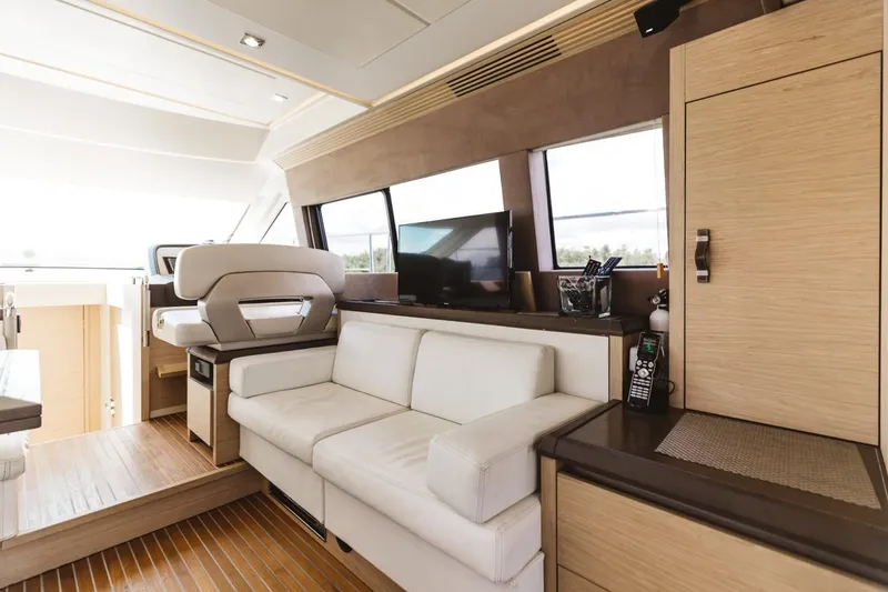 Slide: The Image of Luxurious interior of 2015 Beneteau Monte Carlo 5 yacht with modern furnishings. - 35