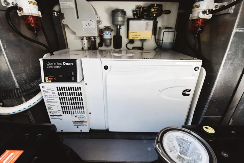 Slide: The Image of Cummins Onan generator in 2015 Beneteau Monte Carlo 5 yacht engine room. - 49