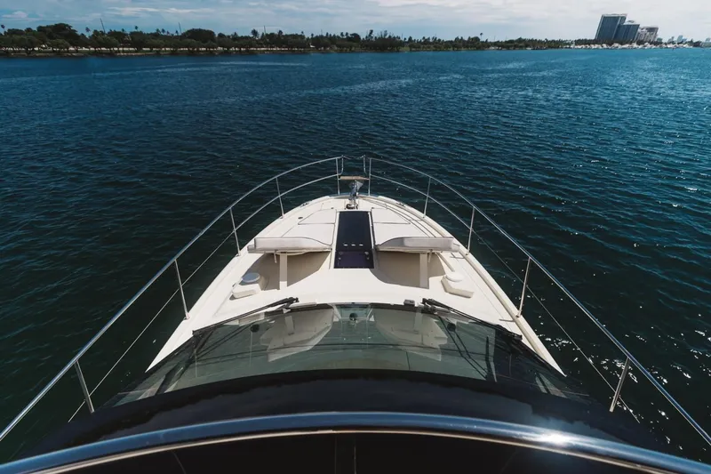 Slide: The Image of 2015 Beneteau Monte Carlo 5 yacht cruising on open water. - 8