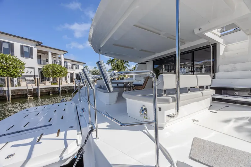 Slide: The Image of 2024 Leopard 53 Powercat yacht with spacious deck and modern design. - 10