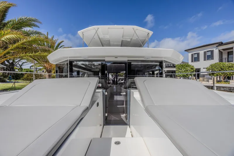 Slide: The Image of 2024 Leopard 53 Powercat yacht with sleek design and spacious deck. - 17