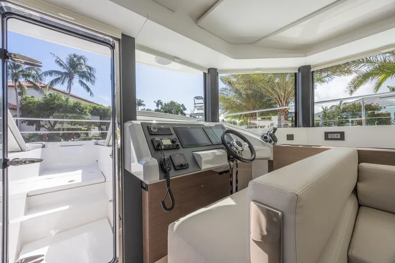 Slide: The Image of Interior view of 2024 Leopard 53 Powercat yacht with modern helm and seating. - 24