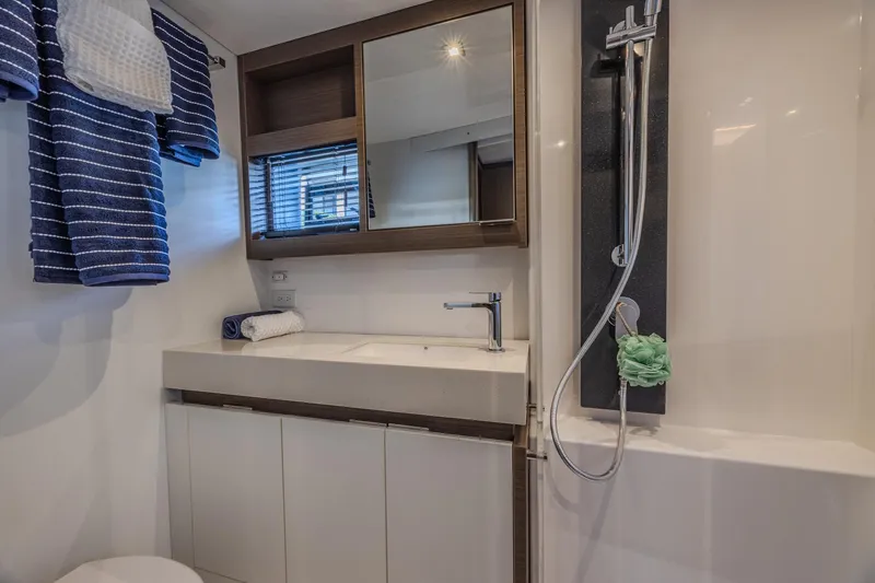 Slide: The Image of 2024 Leopard 53 Powercat bathroom with modern fixtures and sleek design. - 26