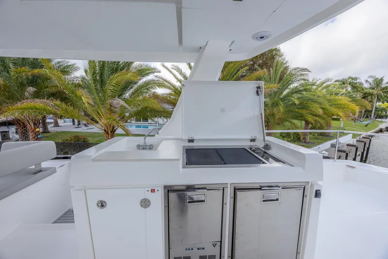 Slide: The Image of Outdoor kitchen on 2024 Leopard 53 Powercat yacht with grill and storage. - 8