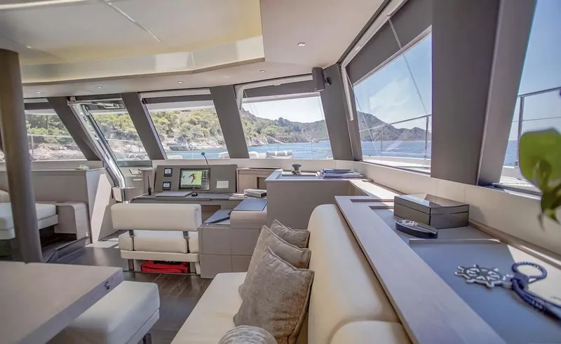 Slide: The Image of Luxurious interior of 2025 Fountaine Pajot Power 67 yacht with panoramic windows and modern design. - 26