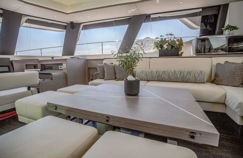 Slide: The Image of Luxurious interior of 2025 Fountaine Pajot Power 67 yacht with modern seating and decor. - 28