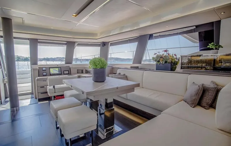 Slide: The Image of Luxurious interior of 2025 Fountaine Pajot Power 67 yacht with modern seating and decor. - 30