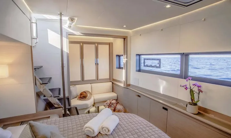Slide: The Image of Luxurious interior of 2025 Fountaine Pajot Power 67 yacht with ocean view. - 34