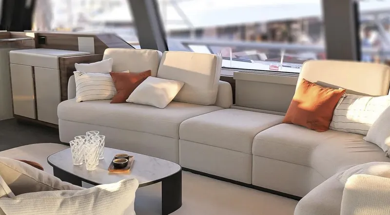 Slide: The Image of Luxurious interior of 2025 Fountaine Pajot Power 80 yacht with elegant seating and decor. - 11