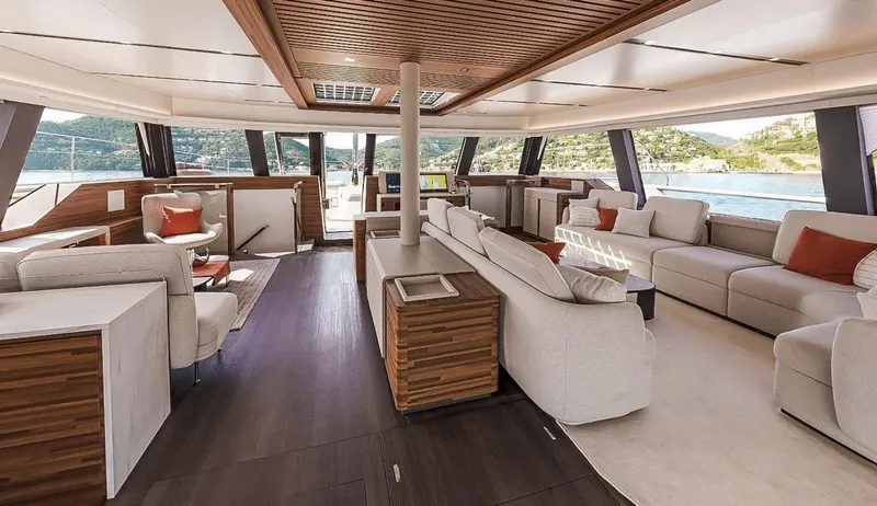 Slide: The Image of Luxurious interior of 2025 Fountaine Pajot Power 80 yacht with elegant seating and scenic views. - 15