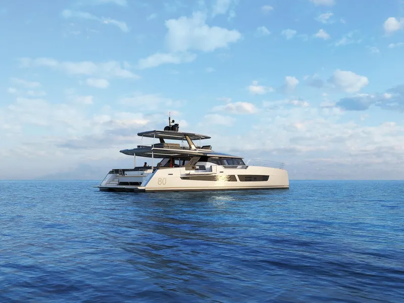 Slide: The Image of Luxury Fountaine Pajot Power 80 yacht on open sea, 2025 model, under a clear blue sky. - 21