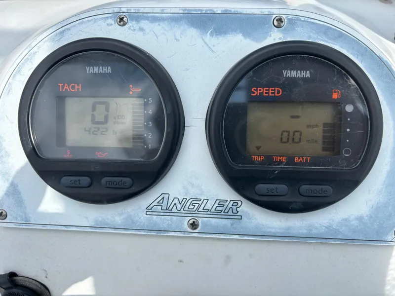 Slide: The Image of Dashboard of 2008 Angler 204WA boat with Yamaha tachometer and speedometer. - 11