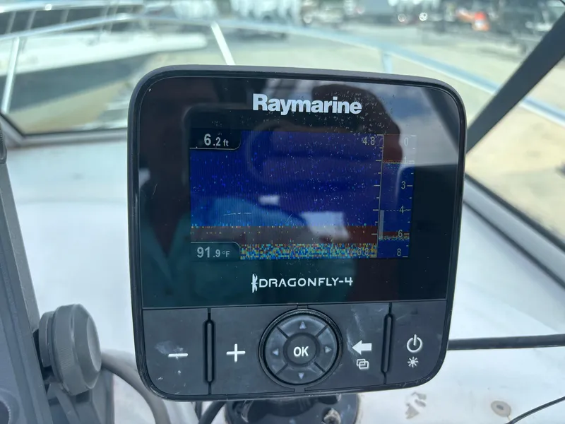Slide: The Image of Raymarine Dragonfly-4 fishfinder on 2008 Angler 204WA boat dashboard. - 26
