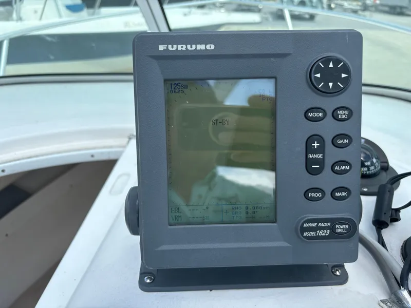 Slide: The Image of Furuno marine radar display on 2008 Angler 204WA boat dashboard. - 27