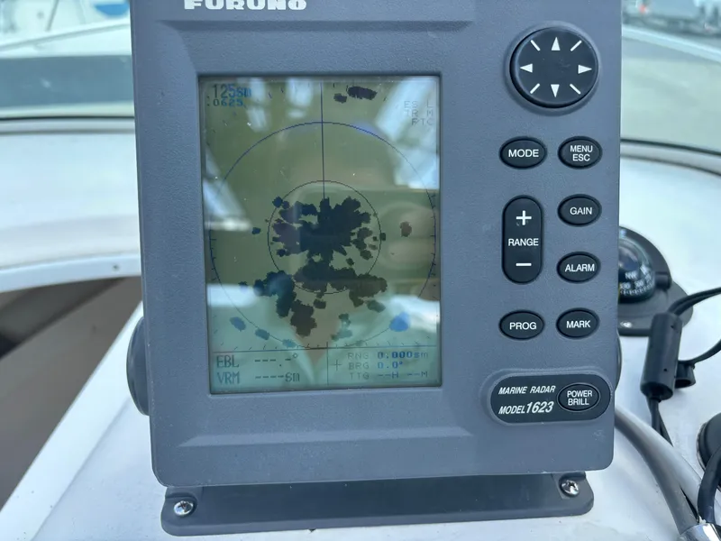 Slide: The Image of Furuno marine radar display on 2008 Angler 204WA boat dashboard. - 28