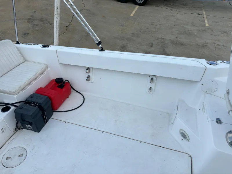 Slide: The Image of 2008 Angler 204WA boat interior with seating and storage compartments. - 36