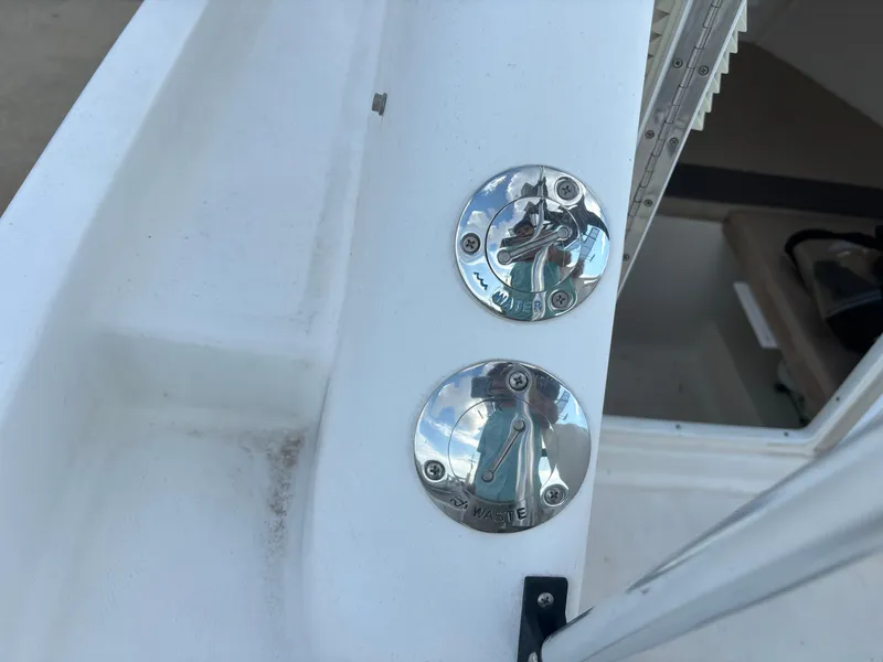 Slide: The Image of Close-up of 2008 Angler 204WA boat fittings, showcasing metal hardware details. - 41