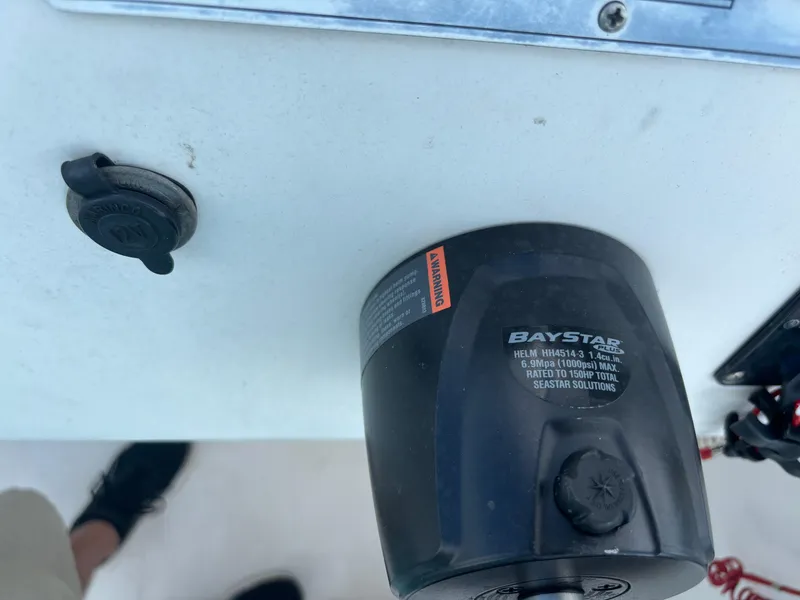 Slide: The Image of Close-up of BayStar hydraulic steering on 2008 Angler 204WA boat. - 46