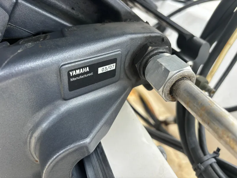 Slide: The Image of Close-up of Yamaha engine part on 2008 Angler 204WA boat. - 6