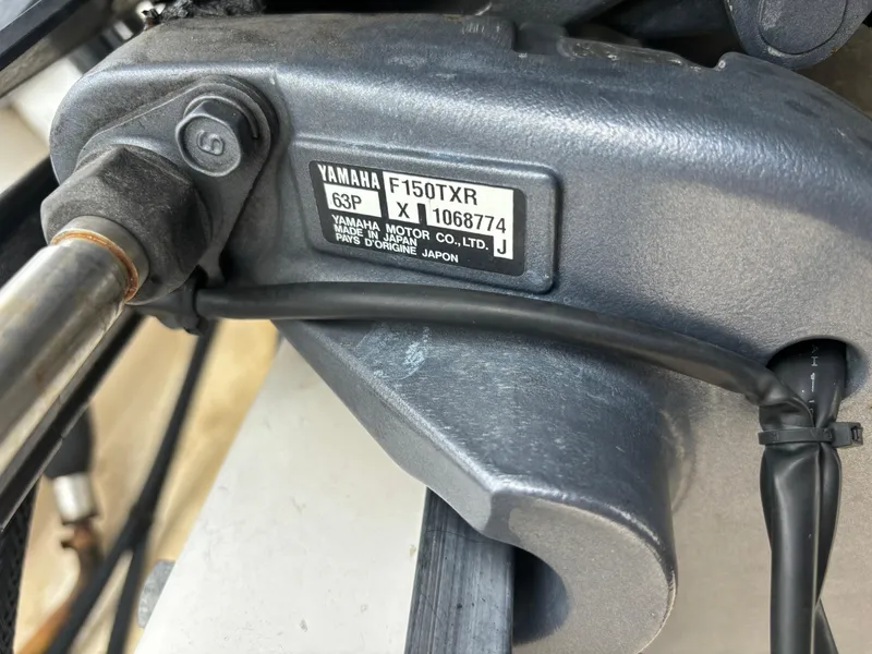 Slide: The Image of Close-up of Yamaha F150TXR engine part on 2008 Angler 204WA boat. - 7
