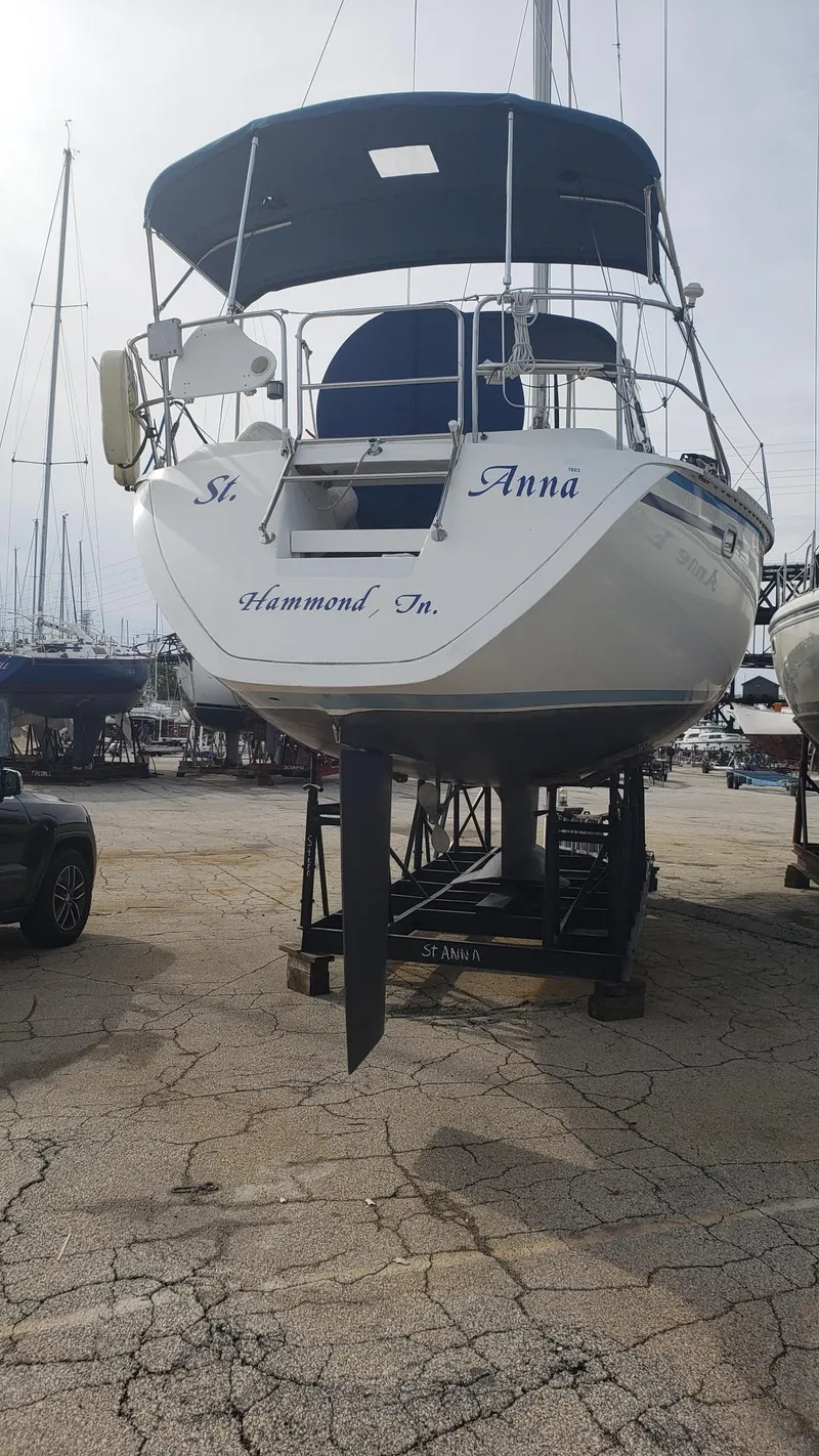 Slide: The Image of 1989 Hunter Legend 37 sailboat on dry dock, named "St. Anna," in Hammond, Indiana. - 36
