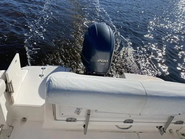 Slide: The Image of 2016 Robalo R222 boat with 200 HP engine cruising on water. - 34