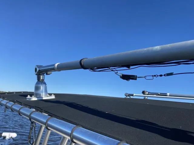 Slide: The Image of Robalo R222 boat detail, 2016 model, showing metal framework against clear blue sky. - 42