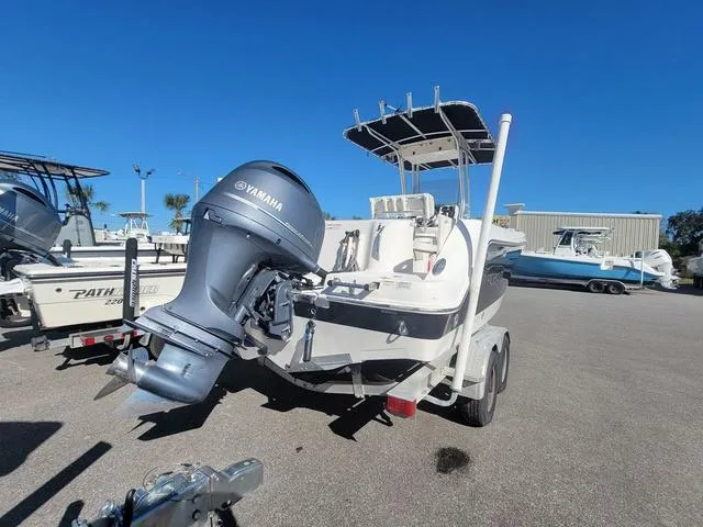 Slide: The Image of 2016 Robalo R222 boat with Yamaha outboard motor on trailer. - 7