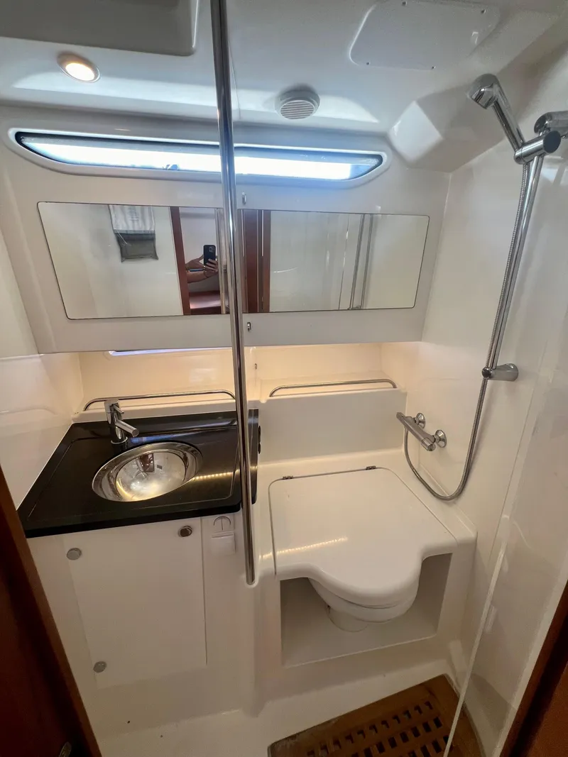 Slide: The Image of Compact boat bathroom with shower, sink, and toilet in Nimbus T11 #98 TRADE!, 2022 model. - 26