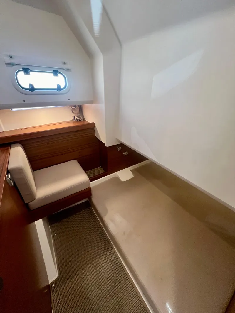 Slide: The Image of Interior cabin of 2022 Nimbus T11 #98 TRADE! with seating and window. - 28