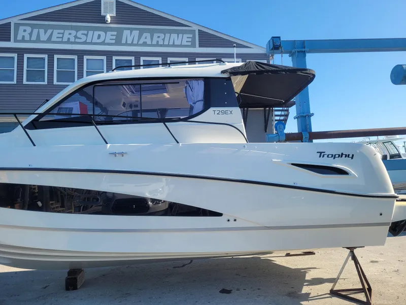 Slide: The Image of 2025 Bayliner Trophy T29 Explorer at Riverside Marine, side view. - 14
