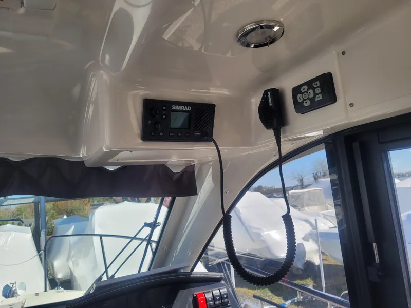 Slide: The Image of Interior view of 2025 Bayliner Trophy T29 Explorer with communication equipment. - 9